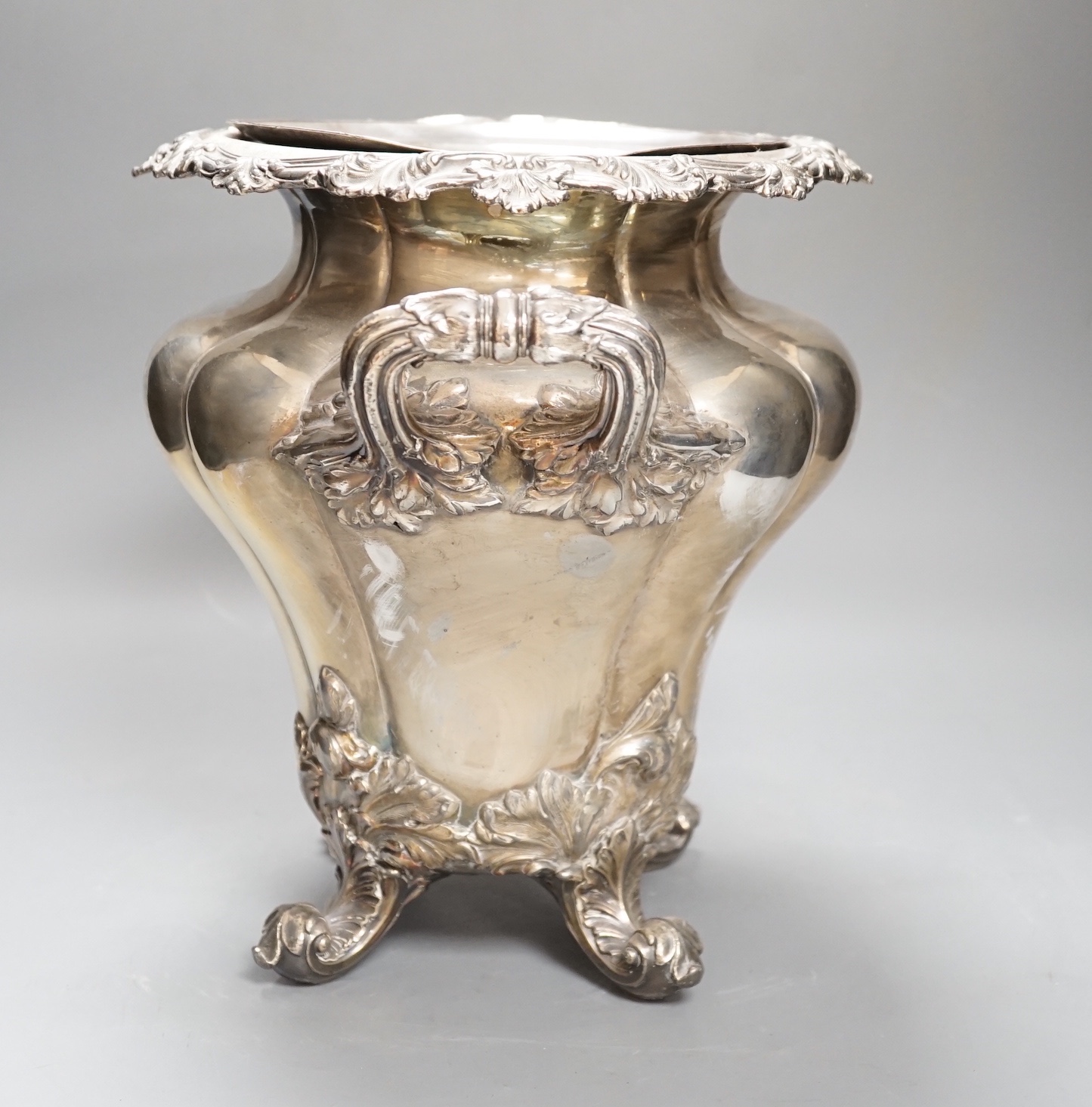 A William IV Old Sheffield plate twin handled wine cooler, with liner, acanthus scrolled borders, on four scrolled feet Height 28cm